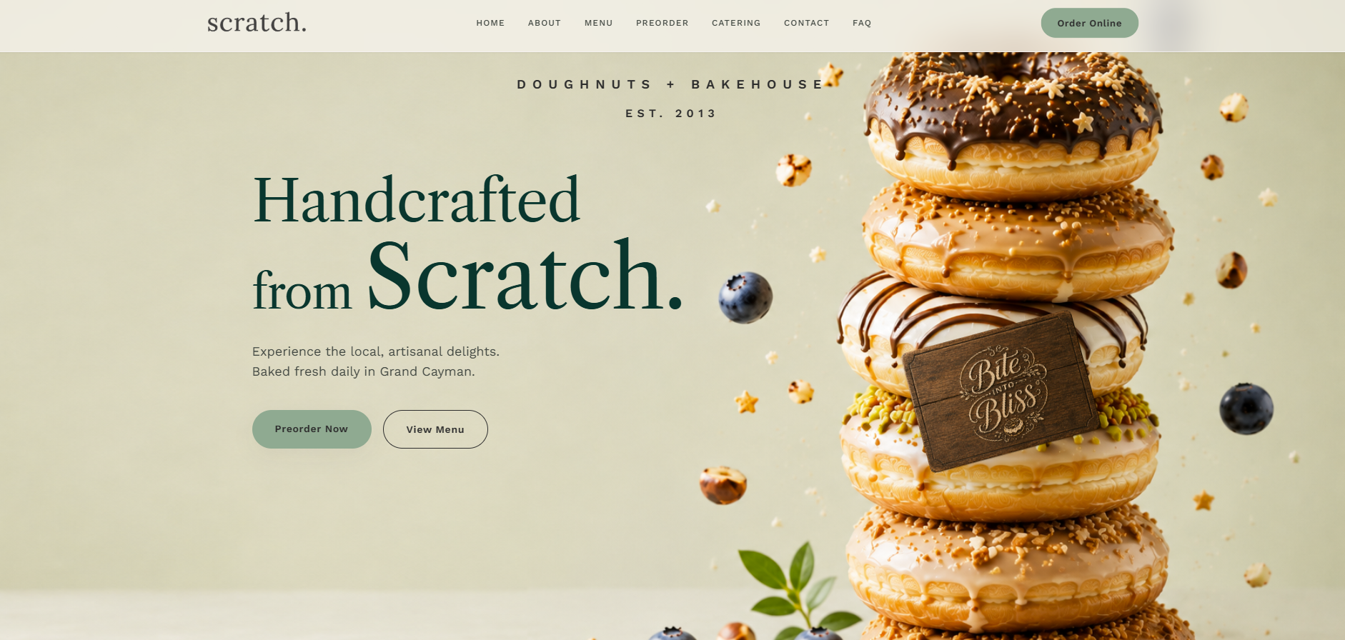Scratch doughnuts and bakehouse website homepage featuring handcrafted doughnuts